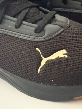 Puma Black Sneakers with Gold Puma Logo